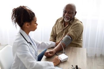 Doctor performing surgery with a team